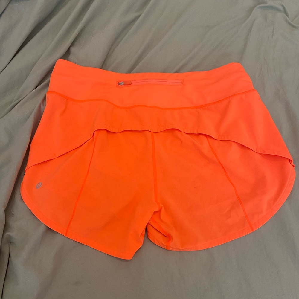 Lululemon Speed Ups, Mid-Rise, 4 inch Size 8 Tall. Color: Highlight orange speed